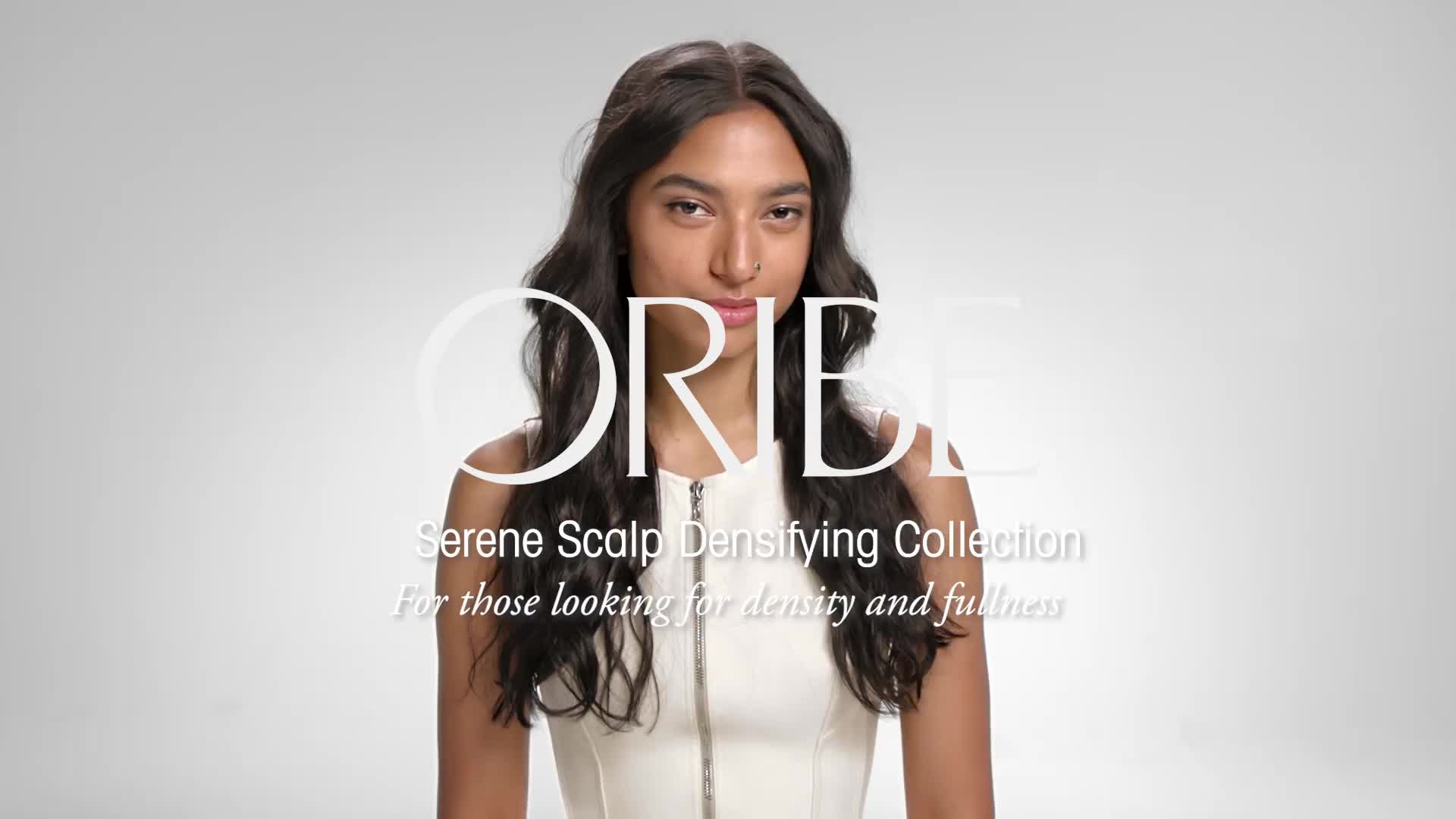 A woman with long dark hair promotes a hair care collection for density and fullness. Text mentions "Serene Scalp Densifying Collection."